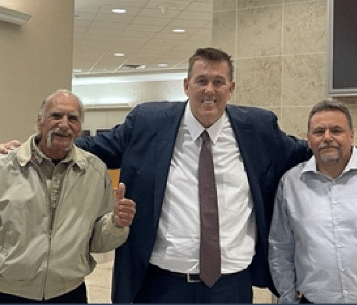 John Stilwell with clients